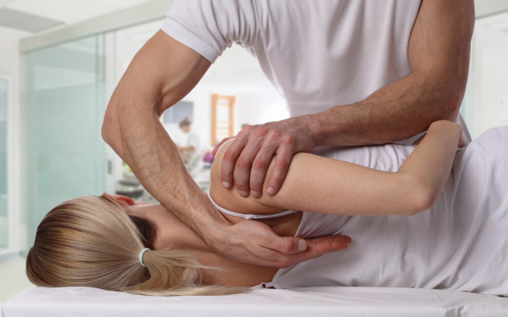 person get chiropractic care for their shoulder